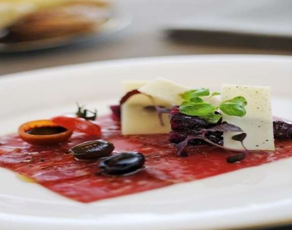 Grade 7 wagyu carpaccio, Parmesan and Taggiasca olives