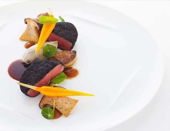 Charcoal crusted veal with king oyster mushroom and carrot