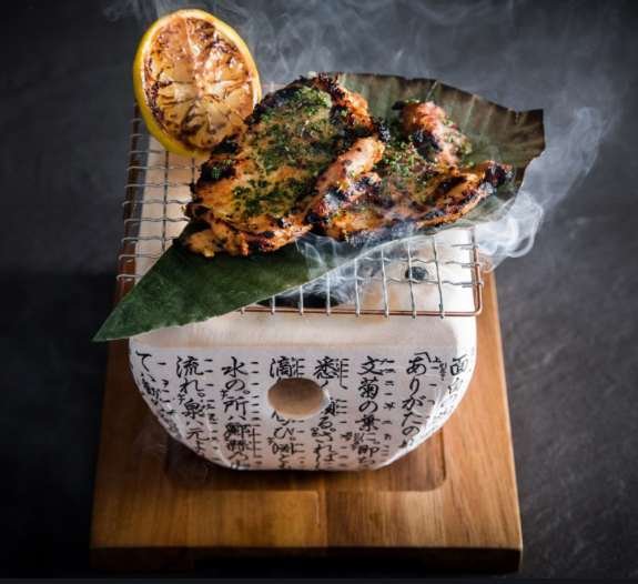 Miso grilled chicken on a binchotan grill