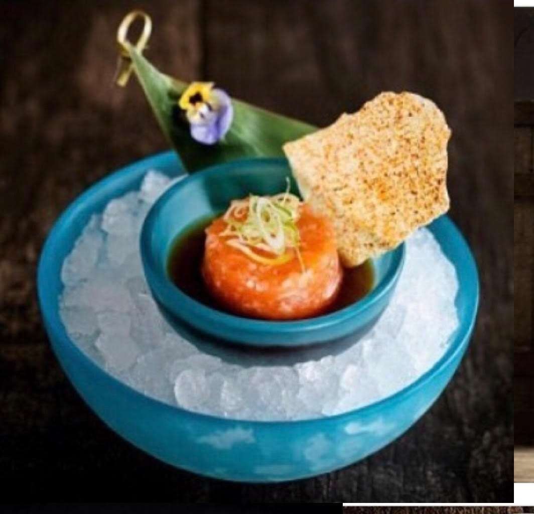 Salmon tartare in a blue bowl on ice, Peter Street Kitchen