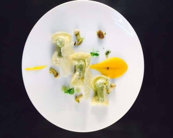 Agnolotti with Parmesan shavings and a pumpkin puree