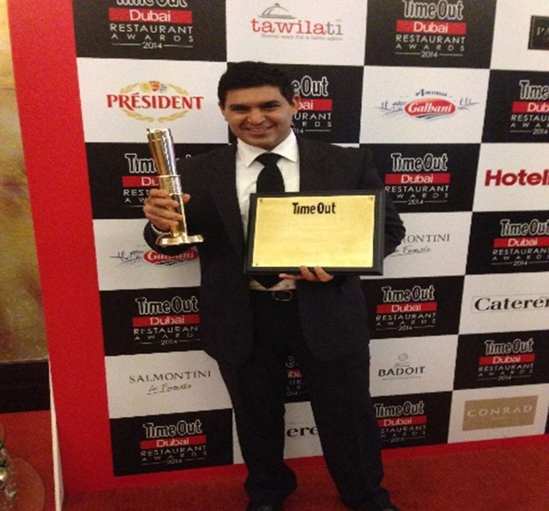 Chef Sameer Sehgal with a Time Out Dubai Restaurant Awards trophy, 2014